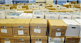 Rows of boxes of shredding documents in an office