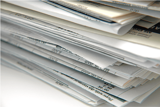 Stack of financial documents for shredding