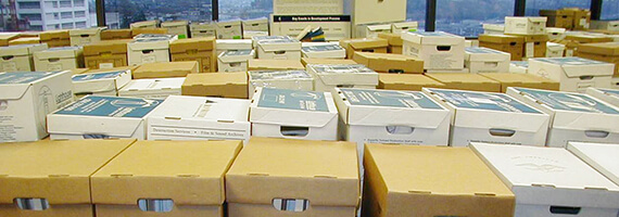 Rows of boxes of shredding documents in an office