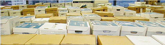 Rows of boxes of shredding documents in an office