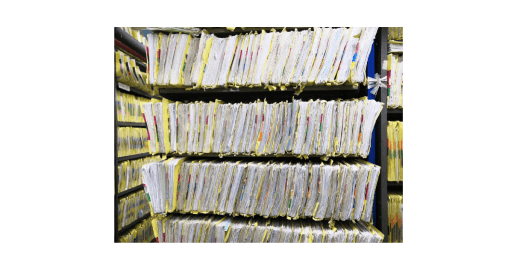 Organized folders of documents on shelves