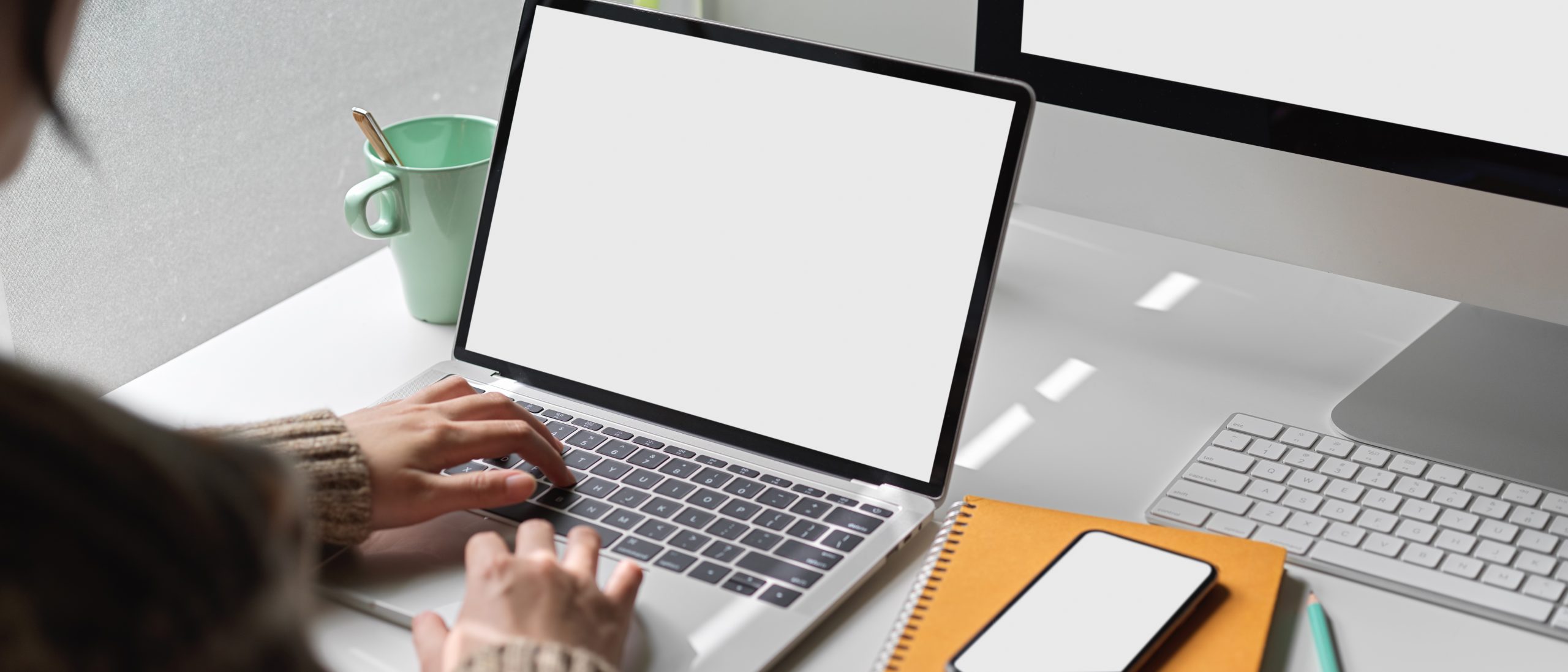 a woman doing research on her laptop