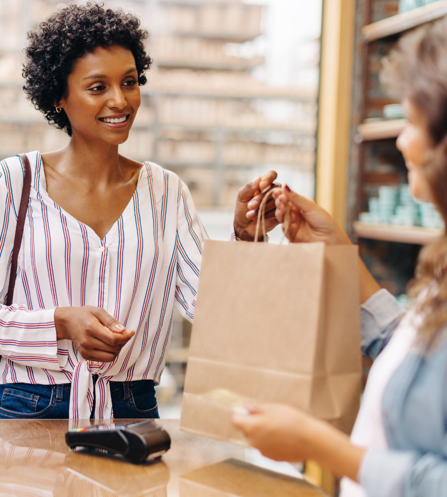 retail customer receiving their bag